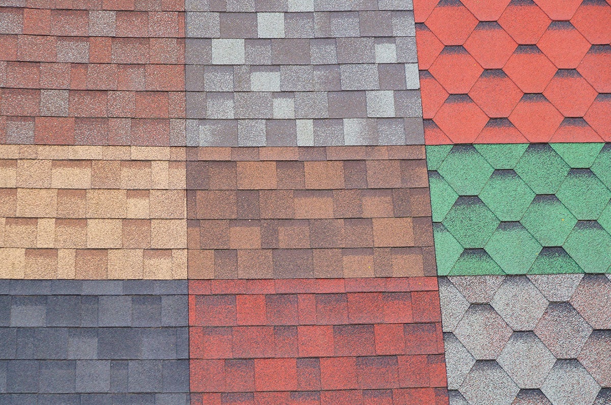 Multiple asphalt shingle samples arranged in a color grid display